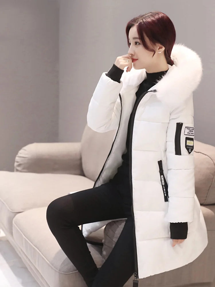 Parka da donna con cappuccio in pelliccia calda invernale Moda comode tasche con cerniera Design Giacca lunga Cappotti femminili sottili ed spessi eleganti