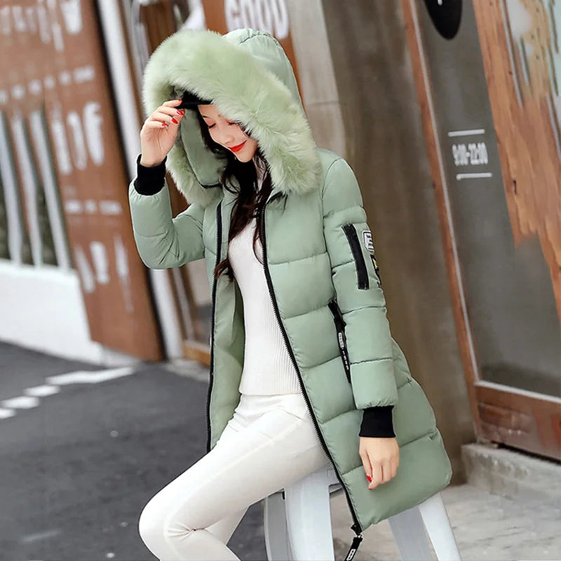Parka da donna con cappuccio in pelliccia calda invernale Moda comode tasche con cerniera Design Giacca lunga Cappotti femminili sottili ed spessi eleganti