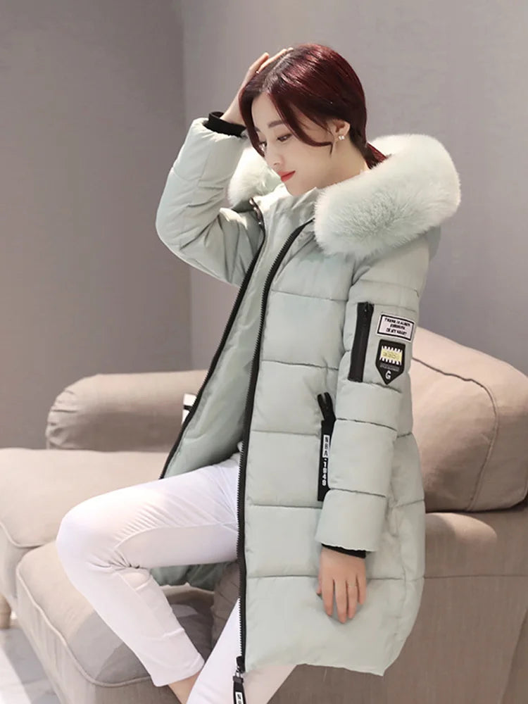 Parka da donna con cappuccio in pelliccia calda invernale Moda comode tasche con cerniera Design Giacca lunga Cappotti femminili sottili ed spessi eleganti
