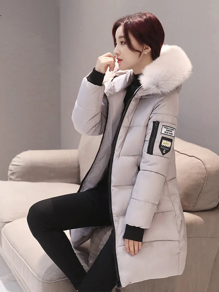 Parka da donna con cappuccio in pelliccia calda invernale Moda comode tasche con cerniera Design Giacca lunga Cappotti femminili sottili ed spessi eleganti