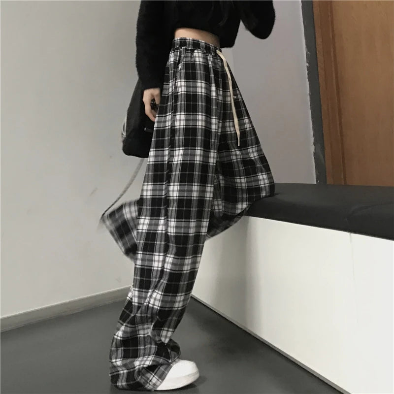 Pantaloni sportivi da donna oversize Pantaloni casual scozzesi neri alla moda Tasche in vita elastiche larghe Pantaloni larghi hip-hop unisex per studenti