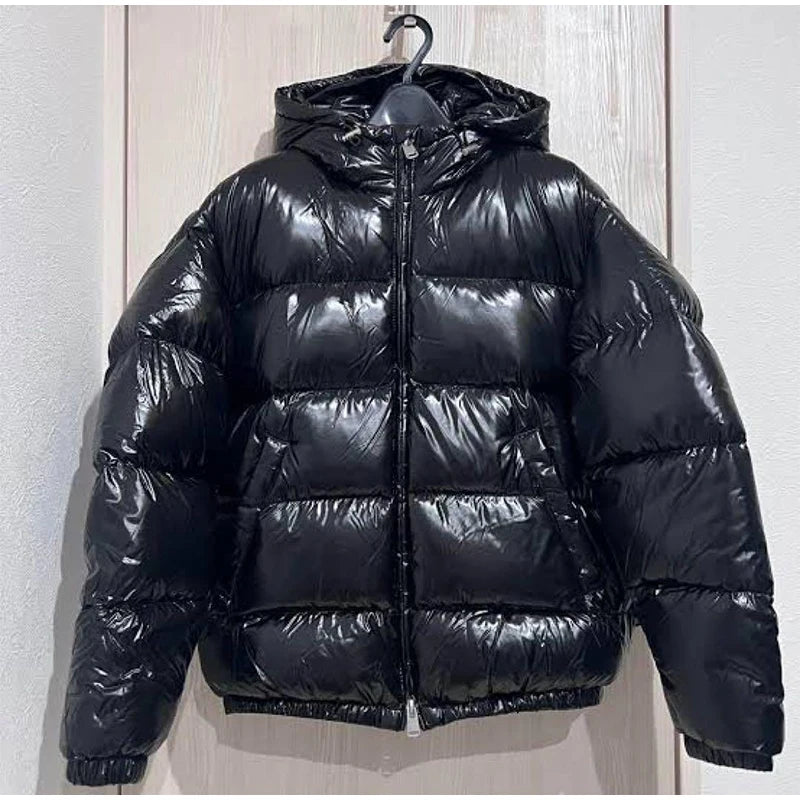 2025 Autunno Inverno Stile neutro Cappotto imbottito in cotone Casual Cerniera con cappuccio Giacca solida Moda Parka caldo a prova di freddo Capispalla