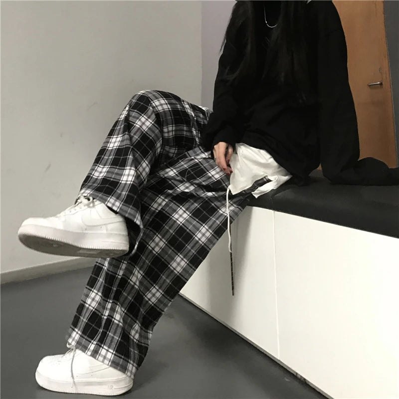 Pantaloni sportivi da donna oversize Pantaloni casual scozzesi neri alla moda Tasche in vita elastiche larghe Pantaloni larghi hip-hop unisex per studenti