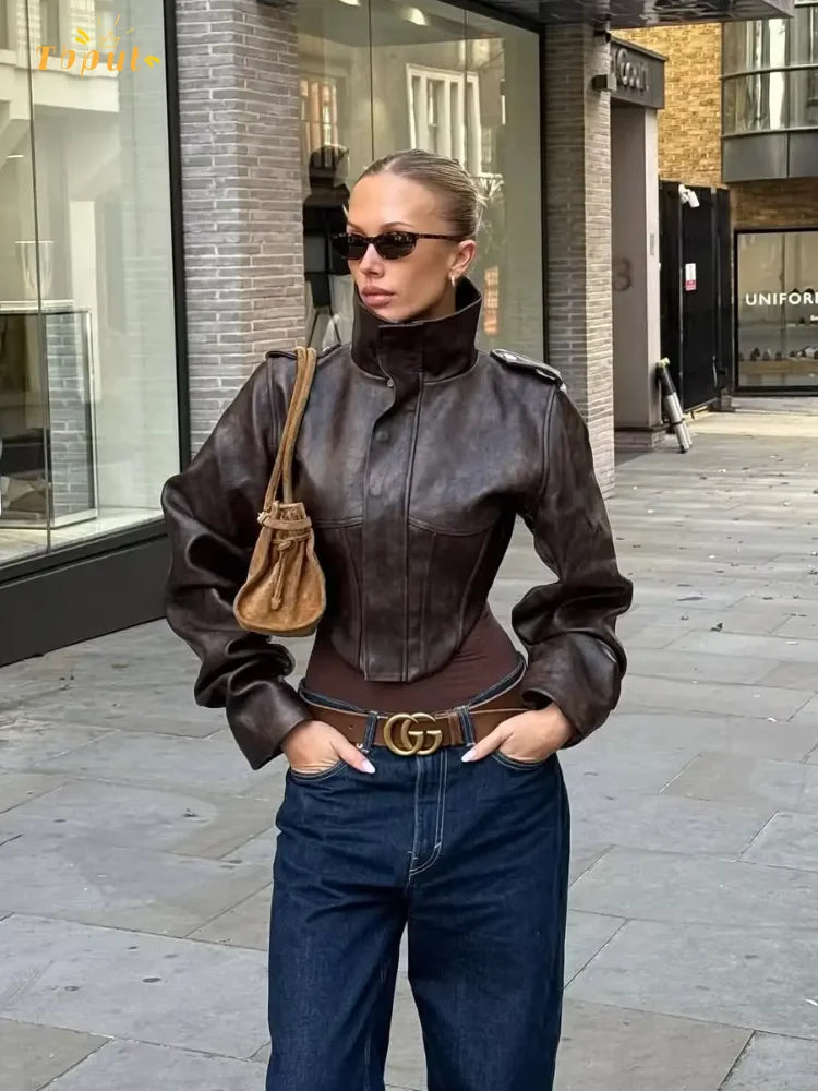Giacca in pelle vintage con cintura in vita solida Moda donna Colletto alla coreana Manica intera Cappotto con fibbia con cerniera 2026 Lady Street Capispalla