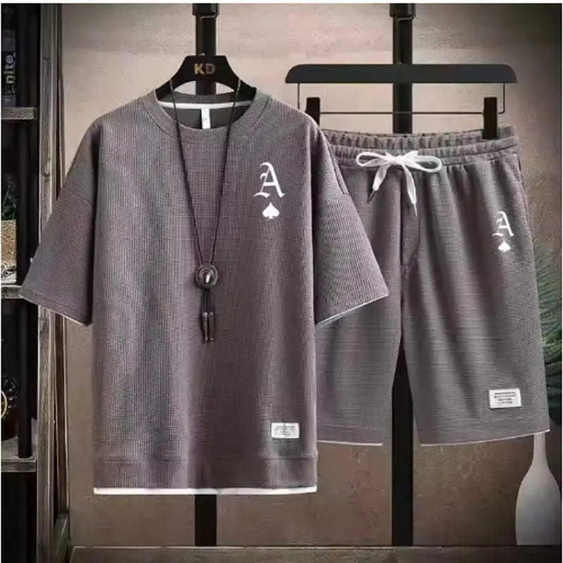 T-shirt a maniche corte da uomo casual alla moda e pantaloncini sportivi estivi all'aperto set da due pezzi casual quotidiano
