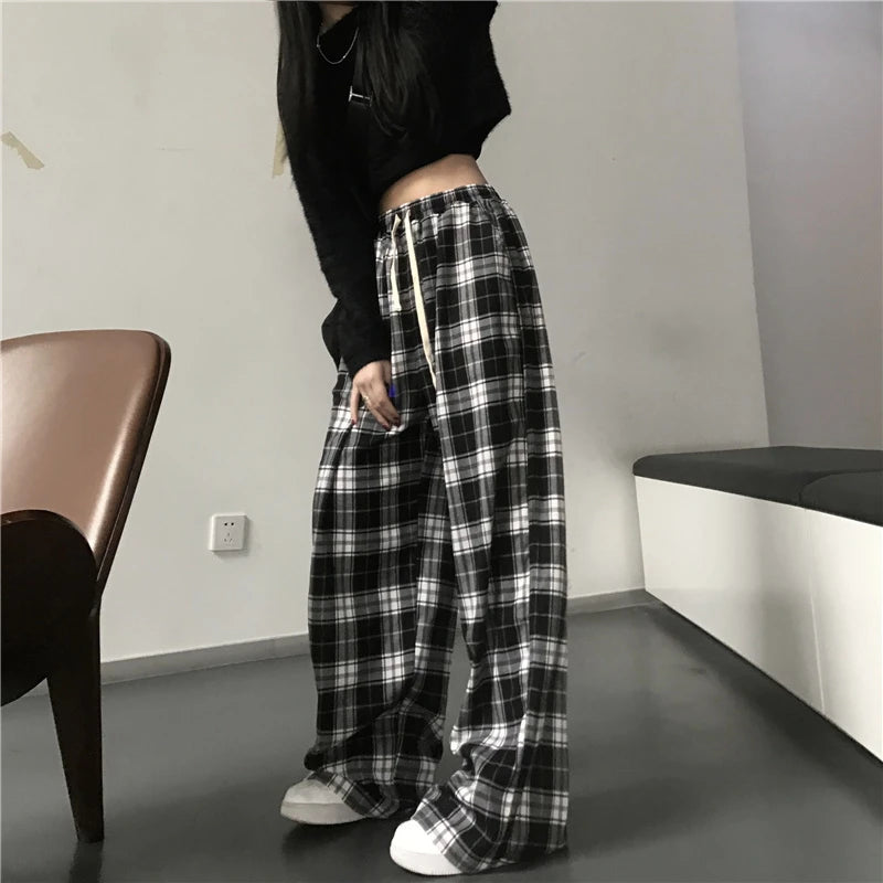 Pantaloni sportivi da donna oversize Pantaloni casual scozzesi neri alla moda Tasche in vita elastiche larghe Pantaloni larghi hip-hop unisex per studenti