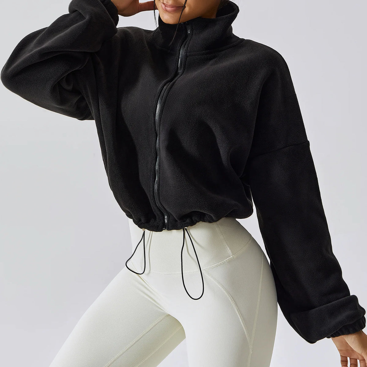 Felpa con cappuccio da donna in pile polare con zip, vestibilità ampia, top corto atletico con colletto rialzato, fori per i pollici e orlo con coulisse per l'autunno inverno