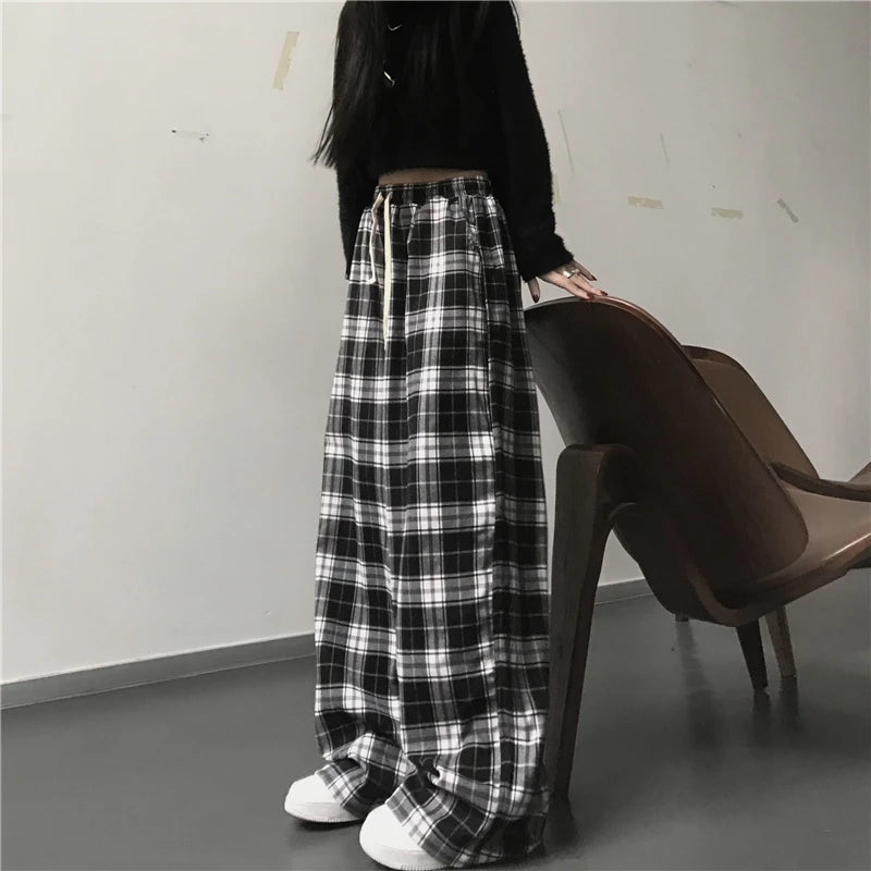 Pantaloni sportivi da donna oversize Pantaloni casual scozzesi neri alla moda Tasche in vita elastiche larghe Pantaloni larghi hip-hop unisex per studenti