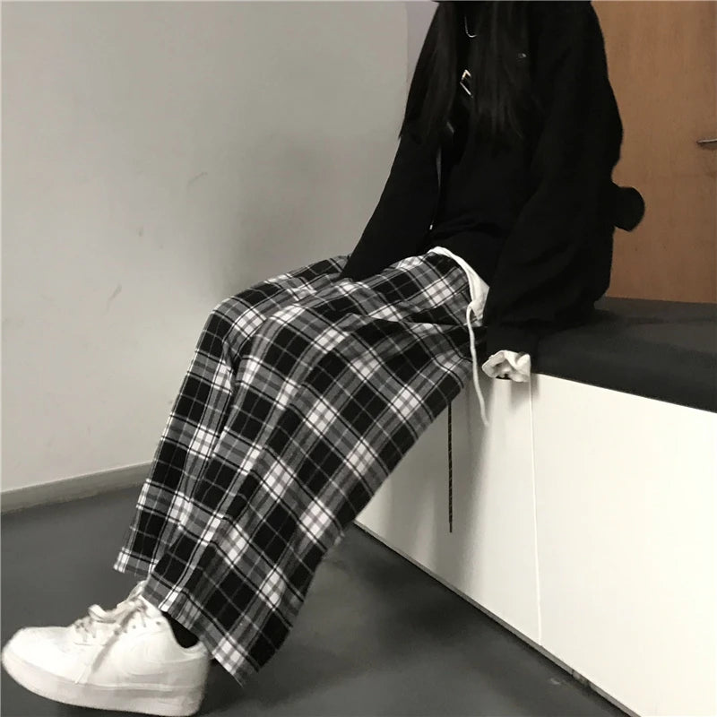 Pantaloni sportivi da donna oversize Pantaloni casual scozzesi neri alla moda Tasche in vita elastiche larghe Pantaloni larghi hip-hop unisex per studenti