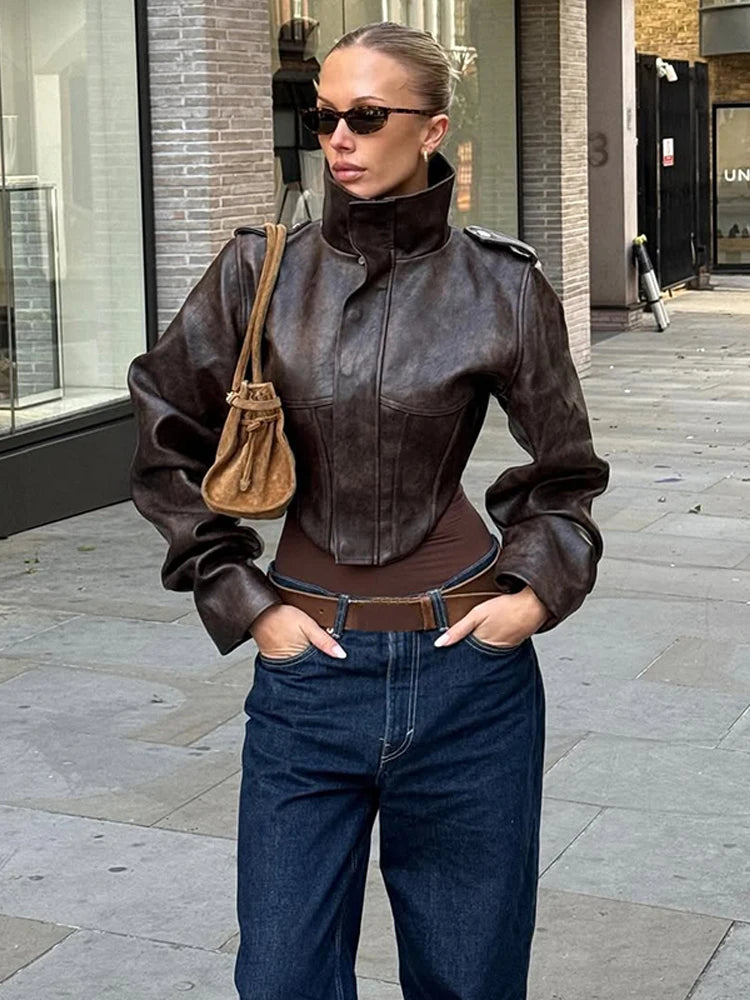 Giacca in pelle vintage con cintura in vita solida Moda donna Colletto alla coreana Manica intera Cappotto con fibbia con cerniera 2026 Lady Street Capispalla