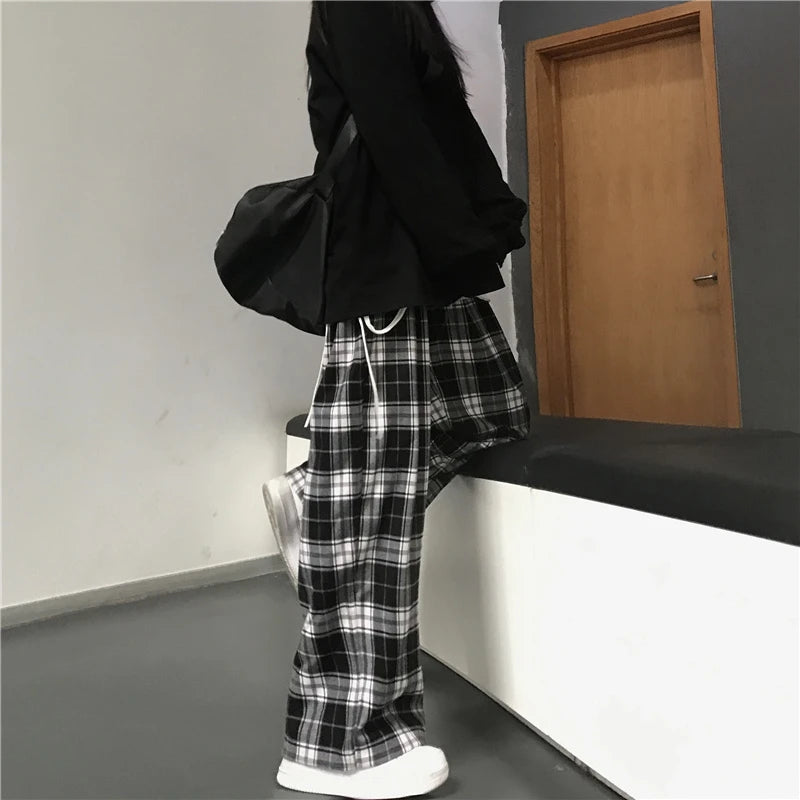 Pantaloni sportivi da donna oversize Pantaloni casual scozzesi neri alla moda Tasche in vita elastiche larghe Pantaloni larghi hip-hop unisex per studenti
