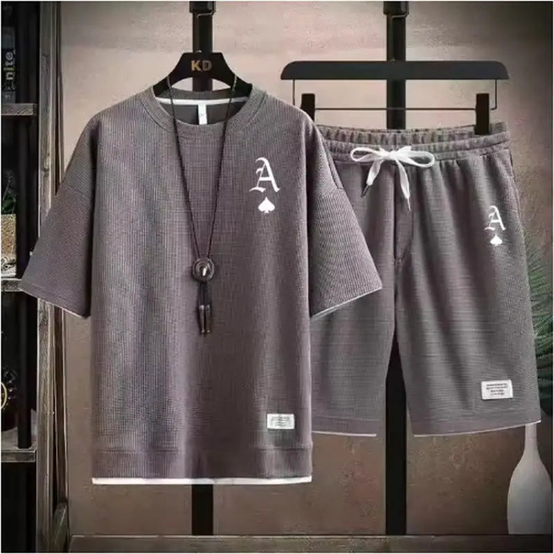 T-shirt a maniche corte da uomo casual alla moda e pantaloncini sportivi estivi all'aperto set da due pezzi casual quotidiano