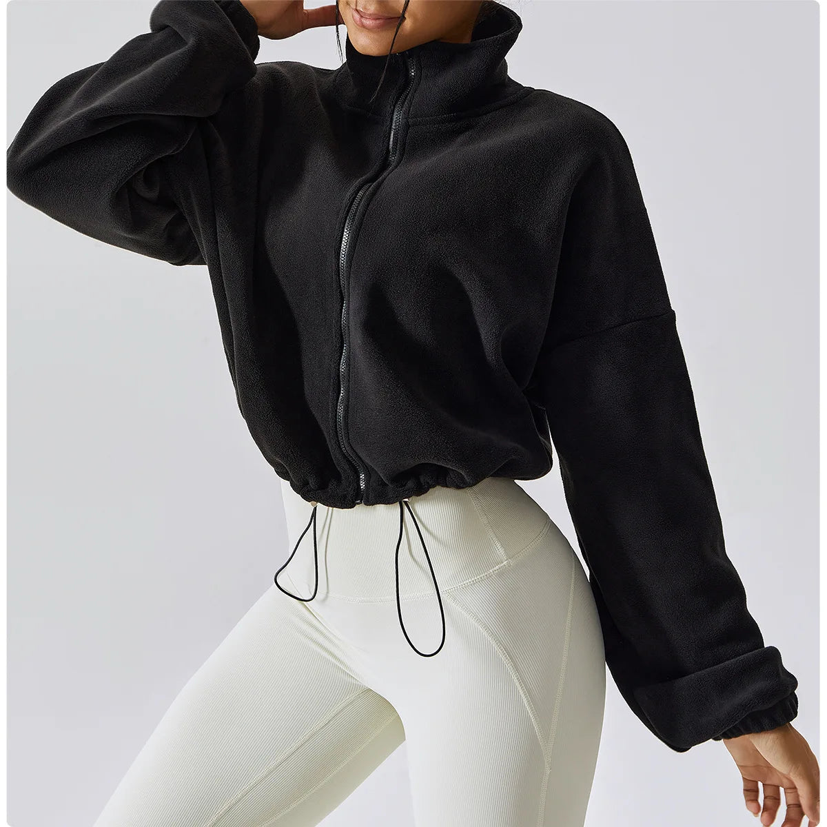 Felpa con cappuccio da donna in pile polare con zip, vestibilità ampia, top corto atletico con colletto rialzato, fori per i pollici e orlo con coulisse per l'autunno inverno
