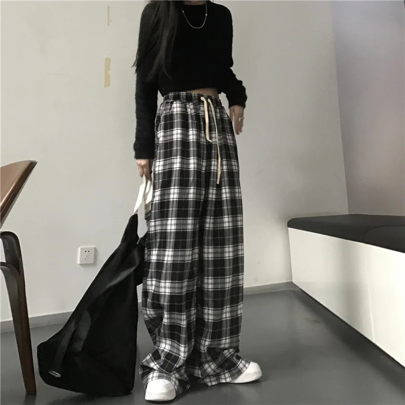 Pantaloni sportivi da donna oversize Pantaloni casual scozzesi neri alla moda Tasche in vita elastiche larghe Pantaloni larghi hip-hop unisex per studenti
