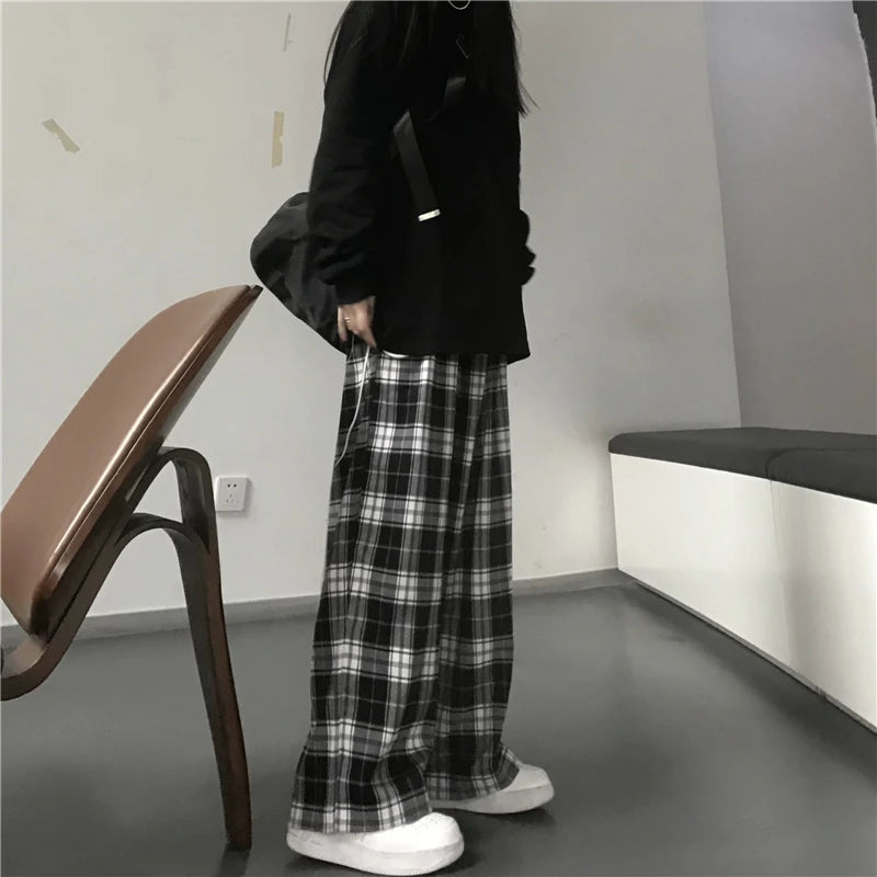 Pantaloni sportivi da donna oversize Pantaloni casual scozzesi neri alla moda Tasche in vita elastiche larghe Pantaloni larghi hip-hop unisex per studenti