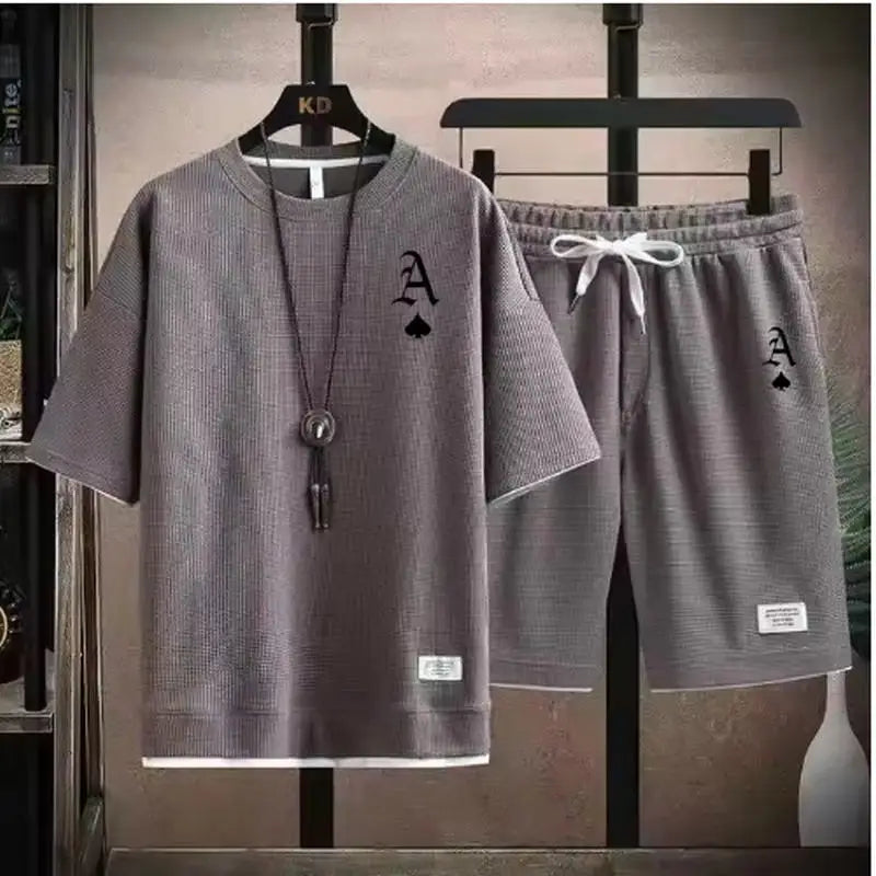 T-shirt a maniche corte da uomo casual alla moda e pantaloncini sportivi estivi all'aperto set da due pezzi casual quotidiano