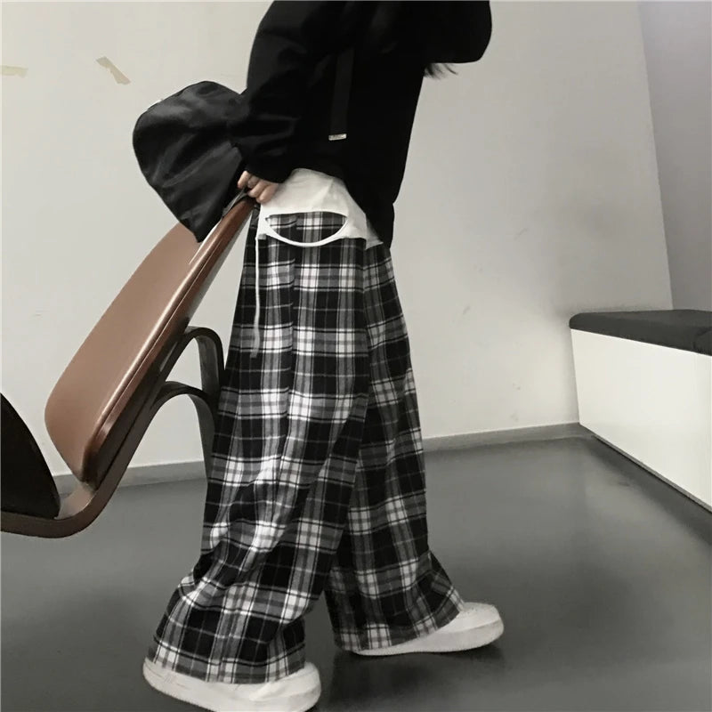 Pantaloni sportivi da donna oversize Pantaloni casual scozzesi neri alla moda Tasche in vita elastiche larghe Pantaloni larghi hip-hop unisex per studenti