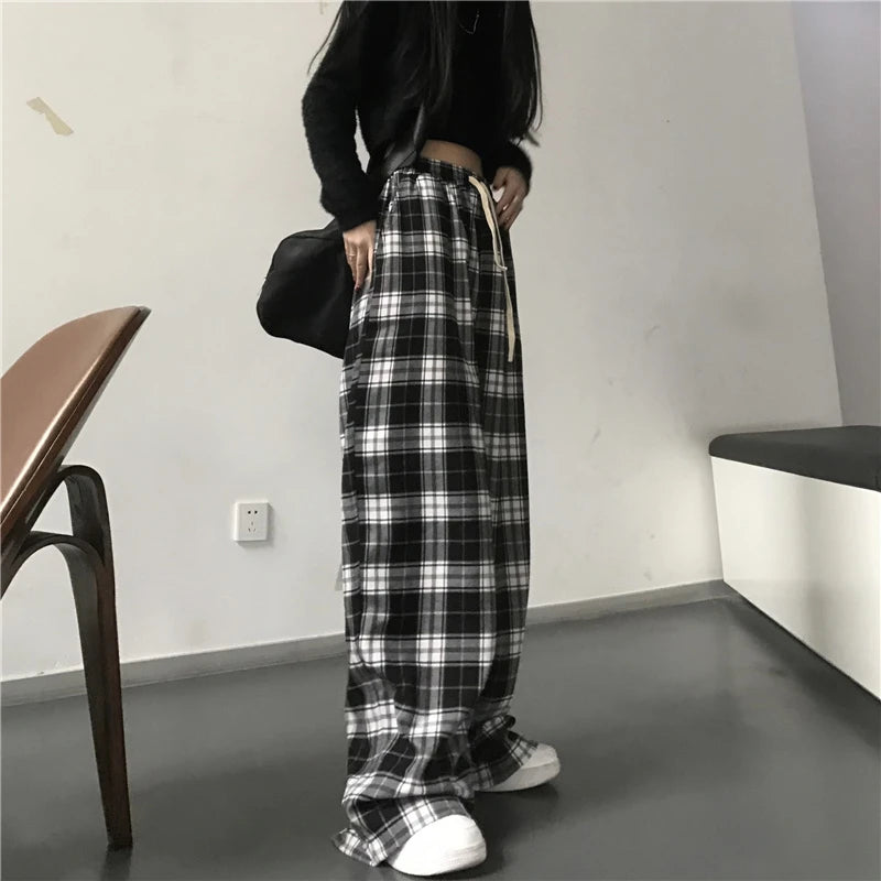 Pantaloni sportivi da donna oversize Pantaloni casual scozzesi neri alla moda Tasche in vita elastiche larghe Pantaloni larghi hip-hop unisex per studenti