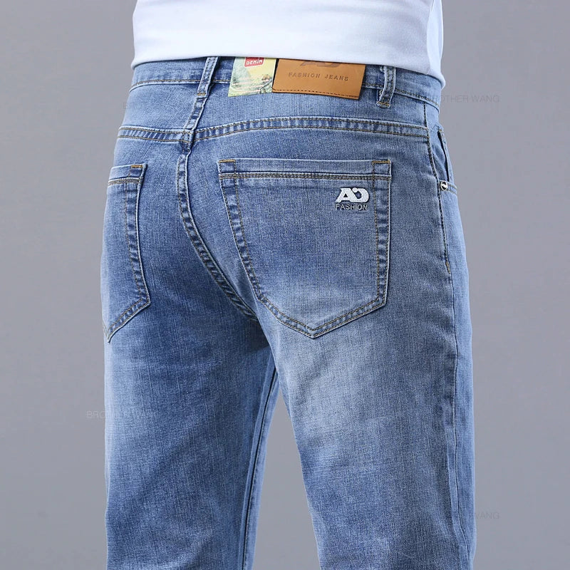 Jeans slim azzurri da uomo primaverili Pantaloni in denim in tessuto elasticizzato casual alla moda Pantaloni classici Grigio fumo
