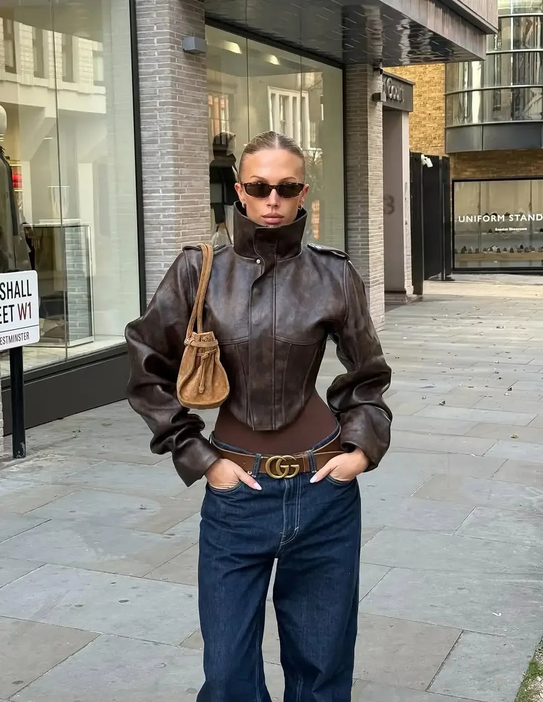 Giacca in pelle vintage con cintura in vita solida Moda donna Colletto alla coreana Manica intera Cappotto con fibbia con cerniera 2026 Lady Street Capispalla